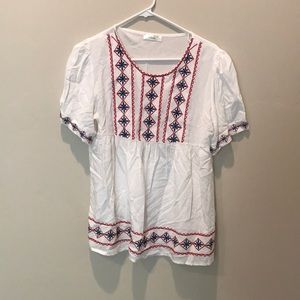 Red white and blue blouse